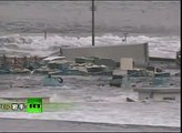 Video of tsunami waves smashing cars after Japan earthquake
