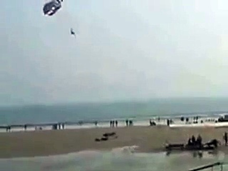 People enjoying flying Paragliding on the sky at the beach side