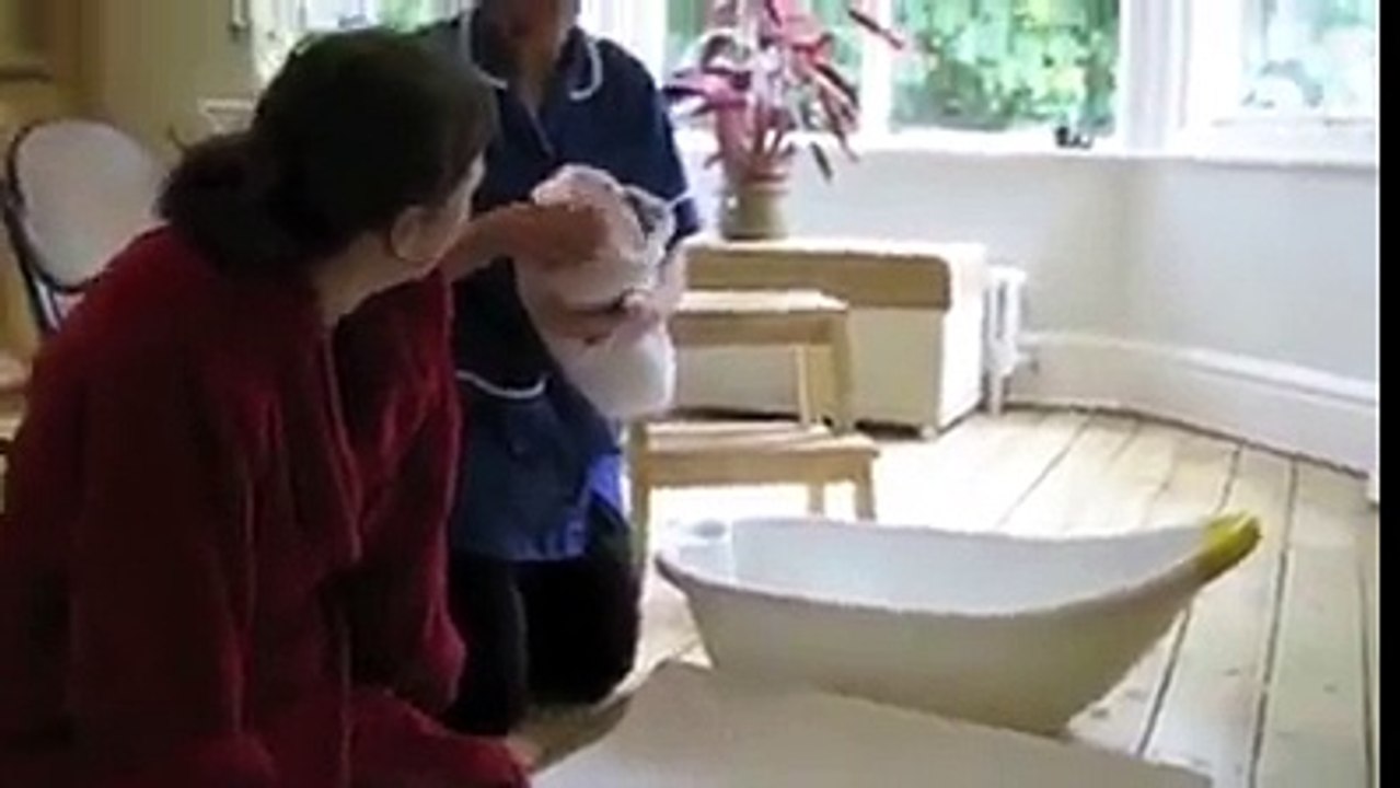Baby Taking a Bath