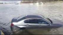 BMW swept into River Thames by tide sinks as it drifts away