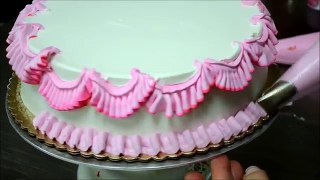 Chef Making a Pink Birthday Cake in Bakery