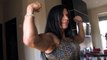 world fitness Beautiful Strong Woman flexing her big muscles