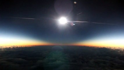 Very rare total Solar Eclipse filmed from an Airplane!