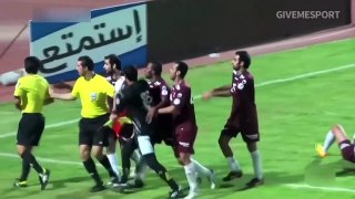 Referee goes crazy kicks and punches players before red card flurry