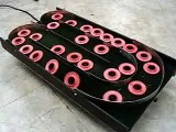 Vibratory Serpentine Conveyor by RoboShop Inc.