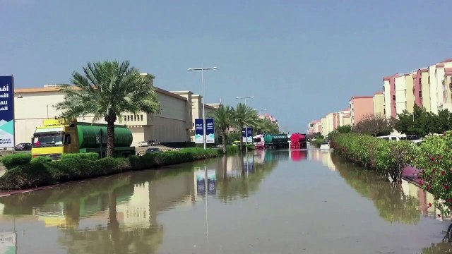 Vehicles half-submerged on Dubai's flooded streets