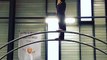Guy Bouncing on Trampoline and Balancing on Poles