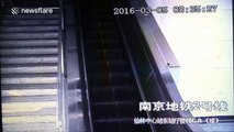 Several people fall over on escalator causing pile-up