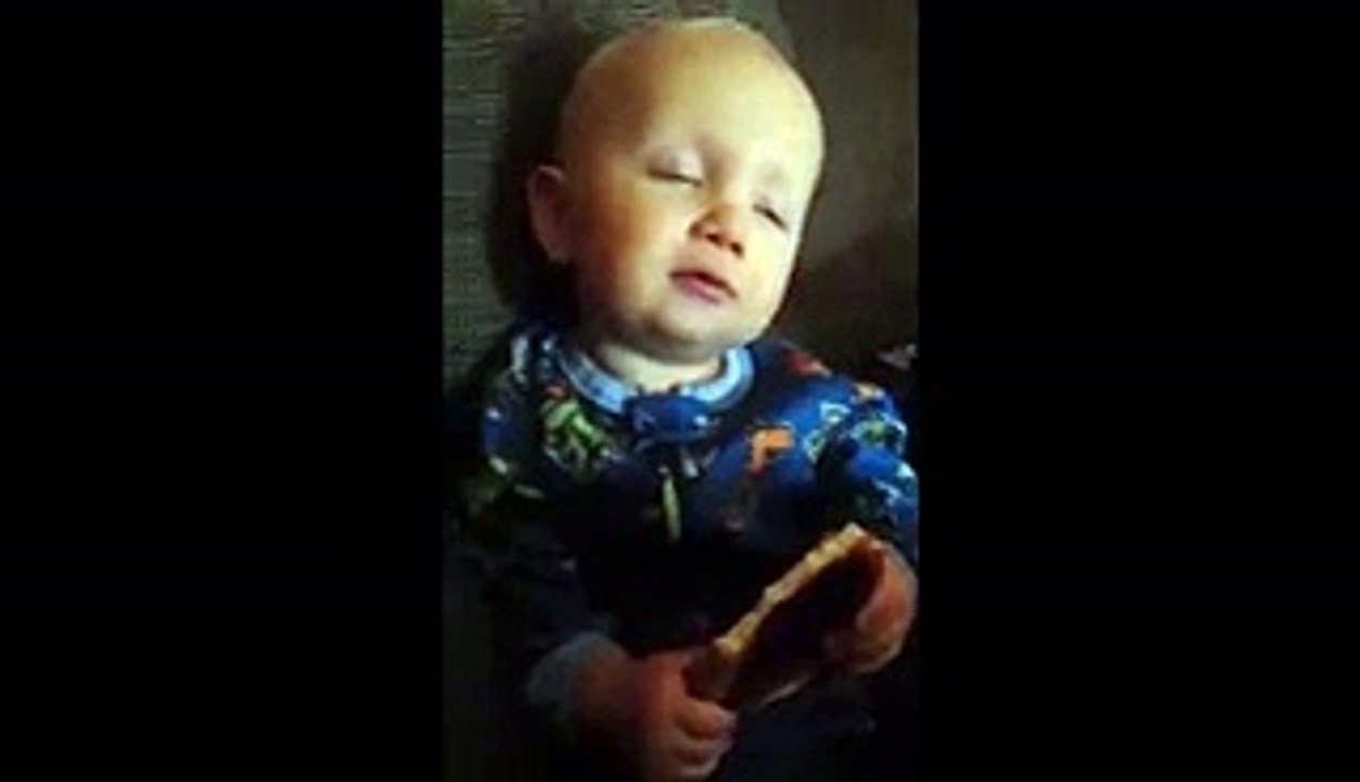 Sleeping Baby Wakes Up When Mom Touches His Toast
