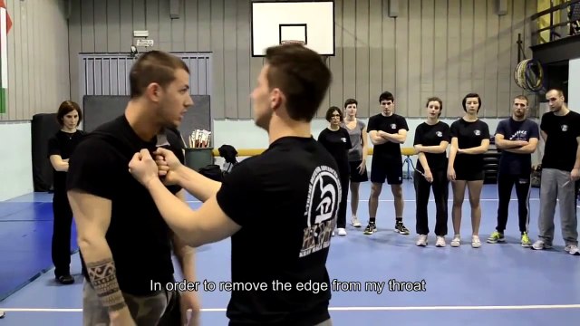 KRAV MAGA TRAINING • How to disarm a Knife to Throat (part 1)