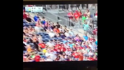 Hooters spring training girl tries to throw the ball 12 feet and fails