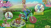 Barbie pasea en Bicicleta con sus perritos