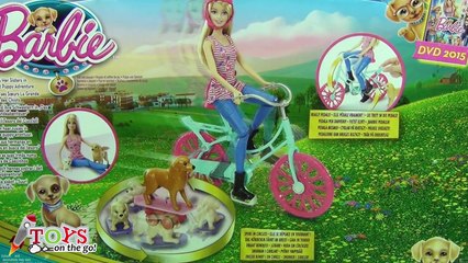 Barbie pasea en Bicicleta con sus perritos
