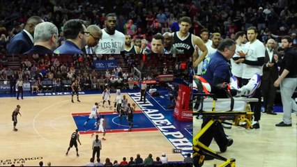 Robert Covington évacué sur une civière après avoir reçu un coup de pied de Jerami Grant en plein visage