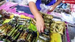 Thai Street Food. Buying and eating more of my favorite street food at a market in Thailan