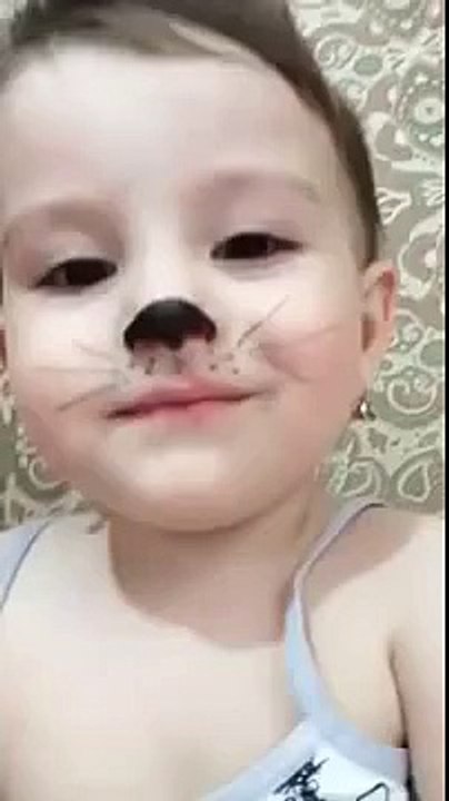 Cute girl imitate the voice of a cat