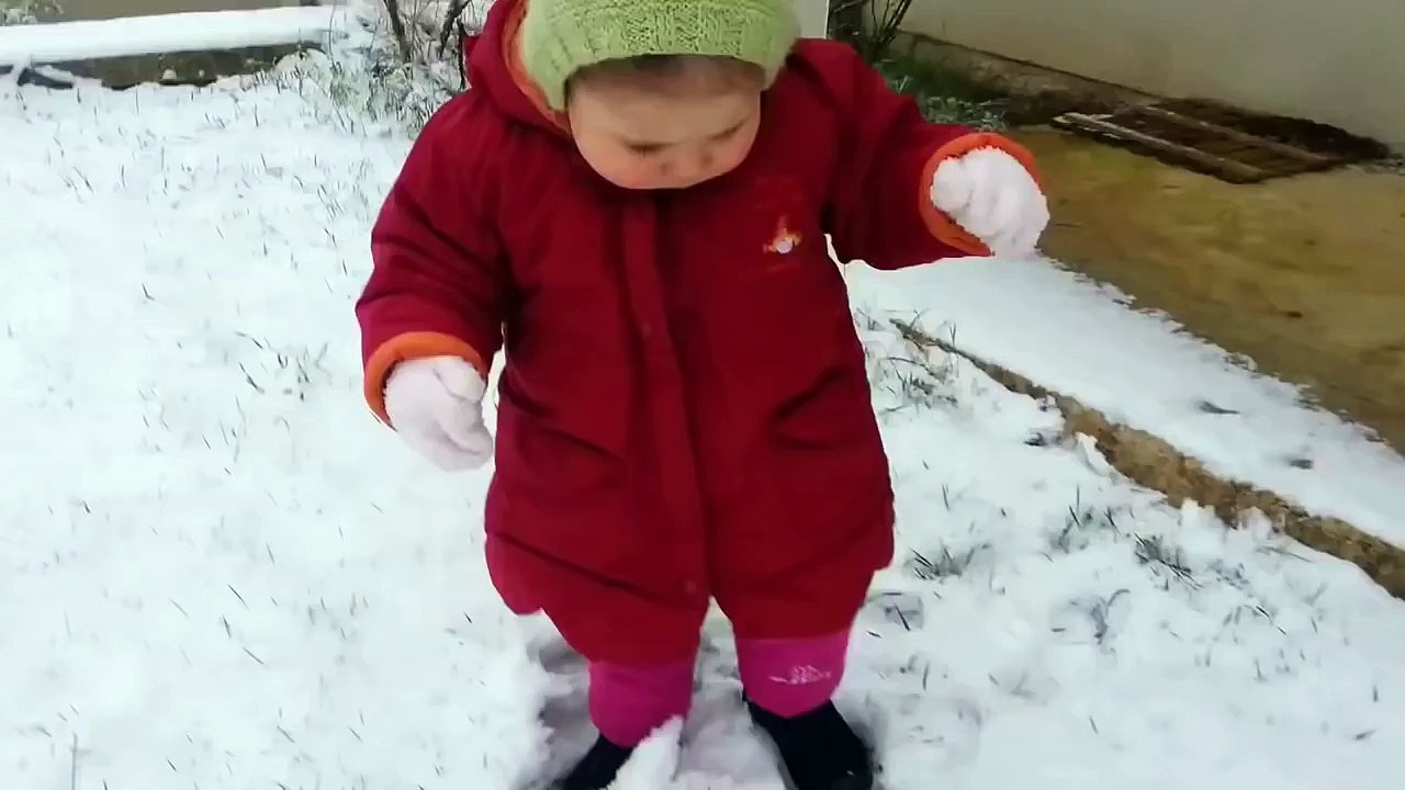 Baby's first steps in the snow result in an adorable fail!