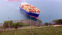 Latest Container ship sails straight to shore by university football field