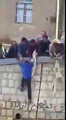 Watch how a brave man saves a guy stuck in flood