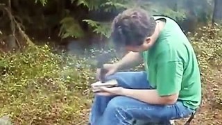 Making a blowgun in the bush.