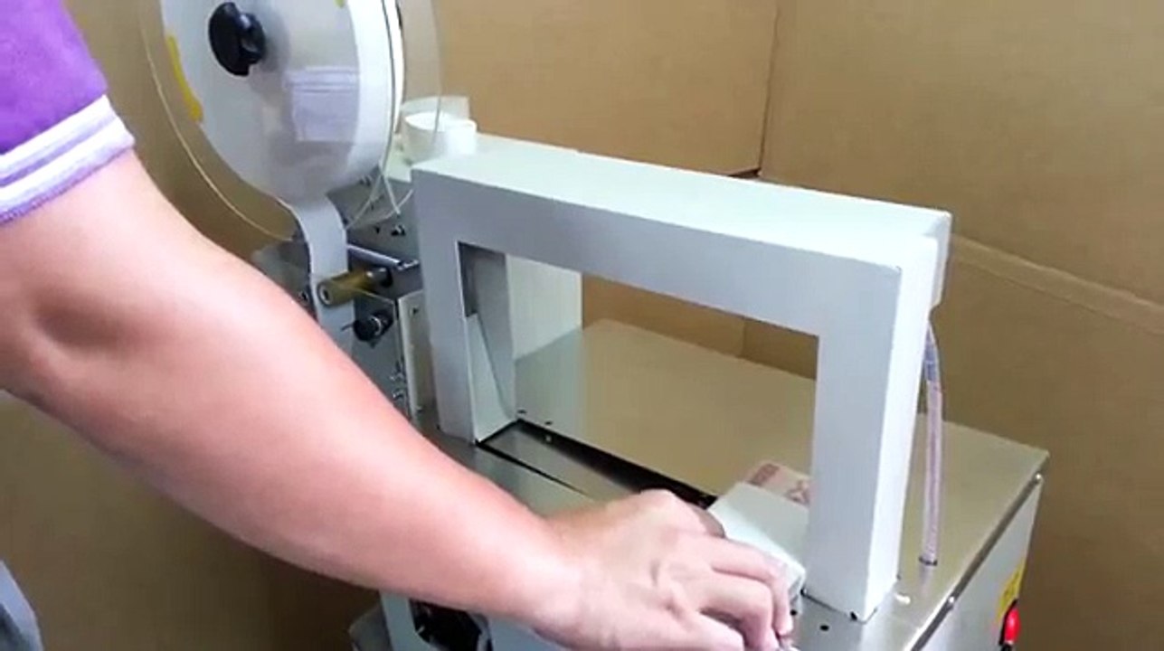 Bandpack banding machine TZ-889A 40mm white paper tape www.bandpack.com.tw