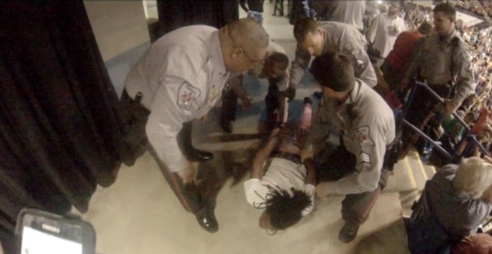 Protester Struck by Trump Supporter, Restrained by Police at North Carolina Rally