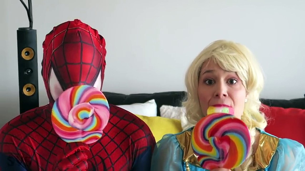 SPIDERMAN vs FROZEN ELSA - Gummy JOKER TONGUE & Giant Lollipop! Superhero Fun in Real Life