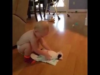 Cute Baby Trying To Change The Gold Cat