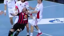 Handball player hugs and kisses opponent as an apology for fouling him