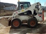 bobcat s300 loading dirt