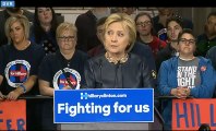 Hillary Clinton needs water to stop coughing uncontrollably during event