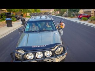 Longboarder Propels Himself Against Truck, Speeds Down Hill