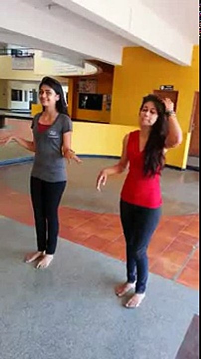 Two Indian Girls dancing to a Bollywood song