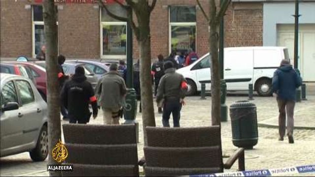 Belgian police injured in raid linked to Paris attacks