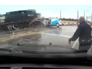 Dashcam Shows Train Crash Into Van