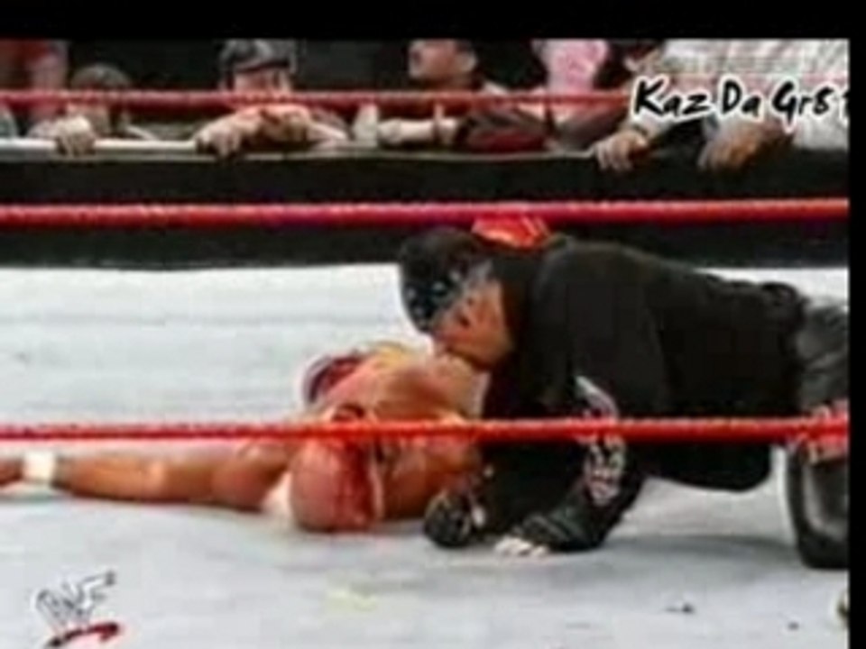 Undertaker Choke Slams Hulk Hogan