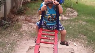 abdul hadi sweet baby playing in garden with his father