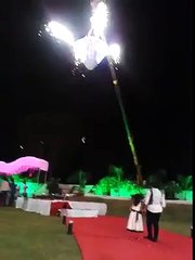 Wedding accident in Ahmedabad .  Bride and groom making an entry in a diamond shaped glass case. Crane toppled and both