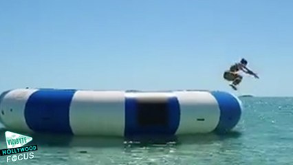 Taylor Swift Hilariously Belly Flops On A Giant Trampoline — Watch