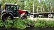 Trailer turned over, Valtra forestry tractor rides to help and gets into a difficult situa
