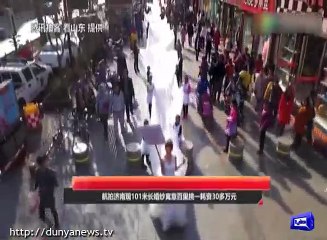 China Company Makes 331ft Long Wedding Dress.