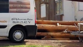 cfd-vosges: surfaçage 1er tour des futs d'une maison en bois ronds (Fuste)