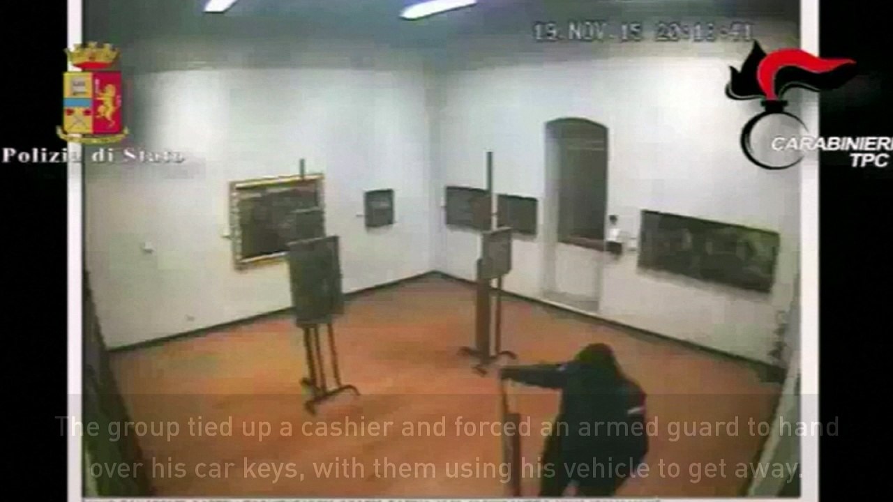 CCTV: Armed thieves steal paintings off a museum wall