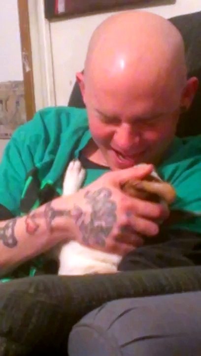 Clint making out with dog