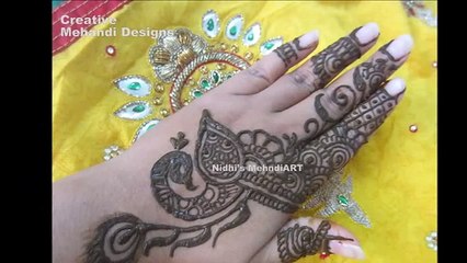 Creative Peacock Bird and Feather Arabic Henna Mehndi Design Tut