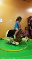Little Girl Rides Mechanical Bull
