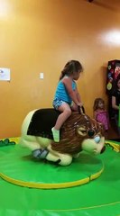 Little Girl Rides Mechanical Bull