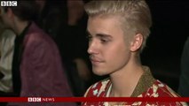 Justin Bieber settles over photographer assault lawsuit