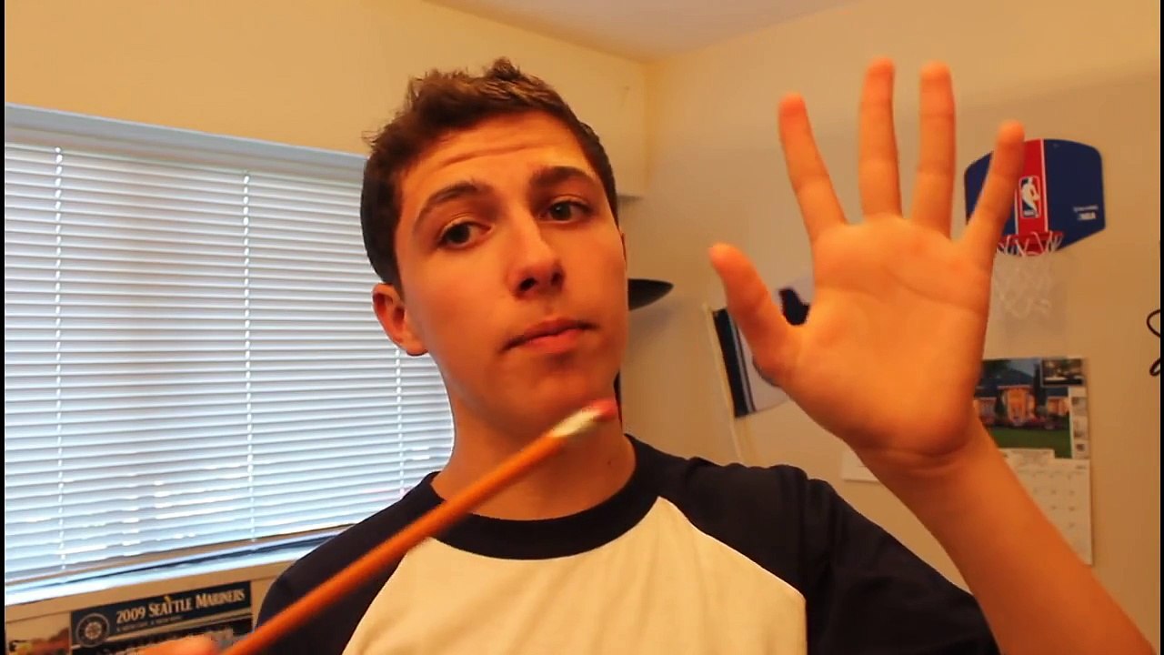 MAGIC TRICK- how to put a pencil in your head hd