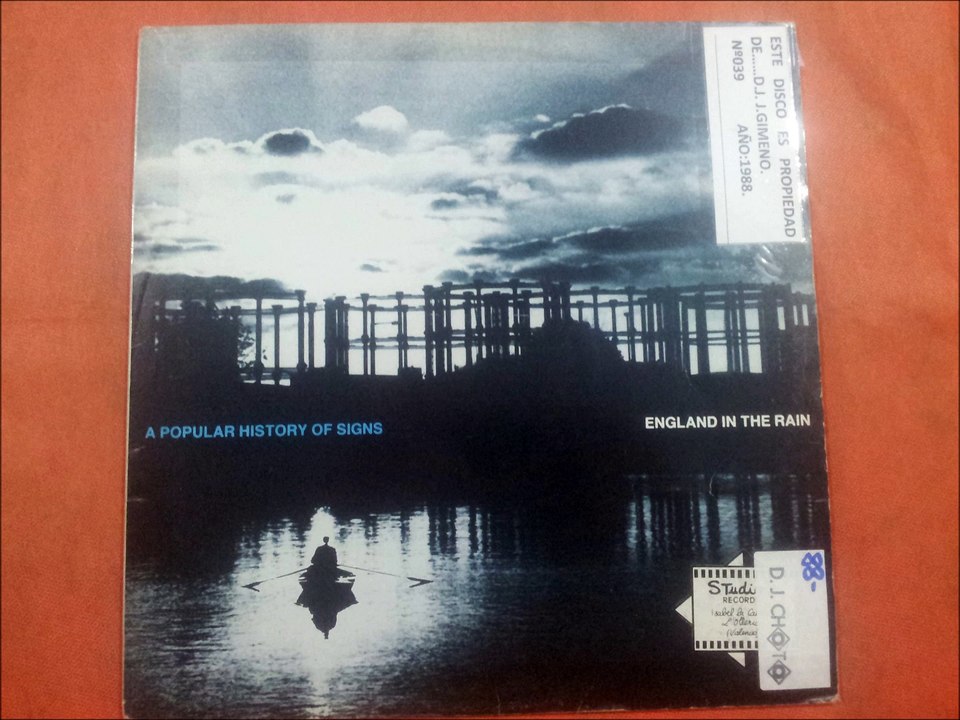 A POPULAR HISTORY OF SIGNS.''ENGLAND IN THE RAIN.''.(WORD TO THE WISE.)(12'' LP.)(1988.)